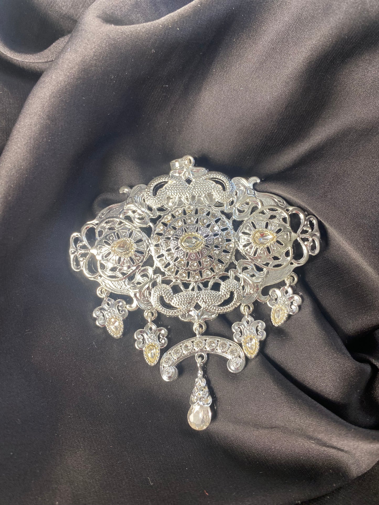 A brooch of your choice