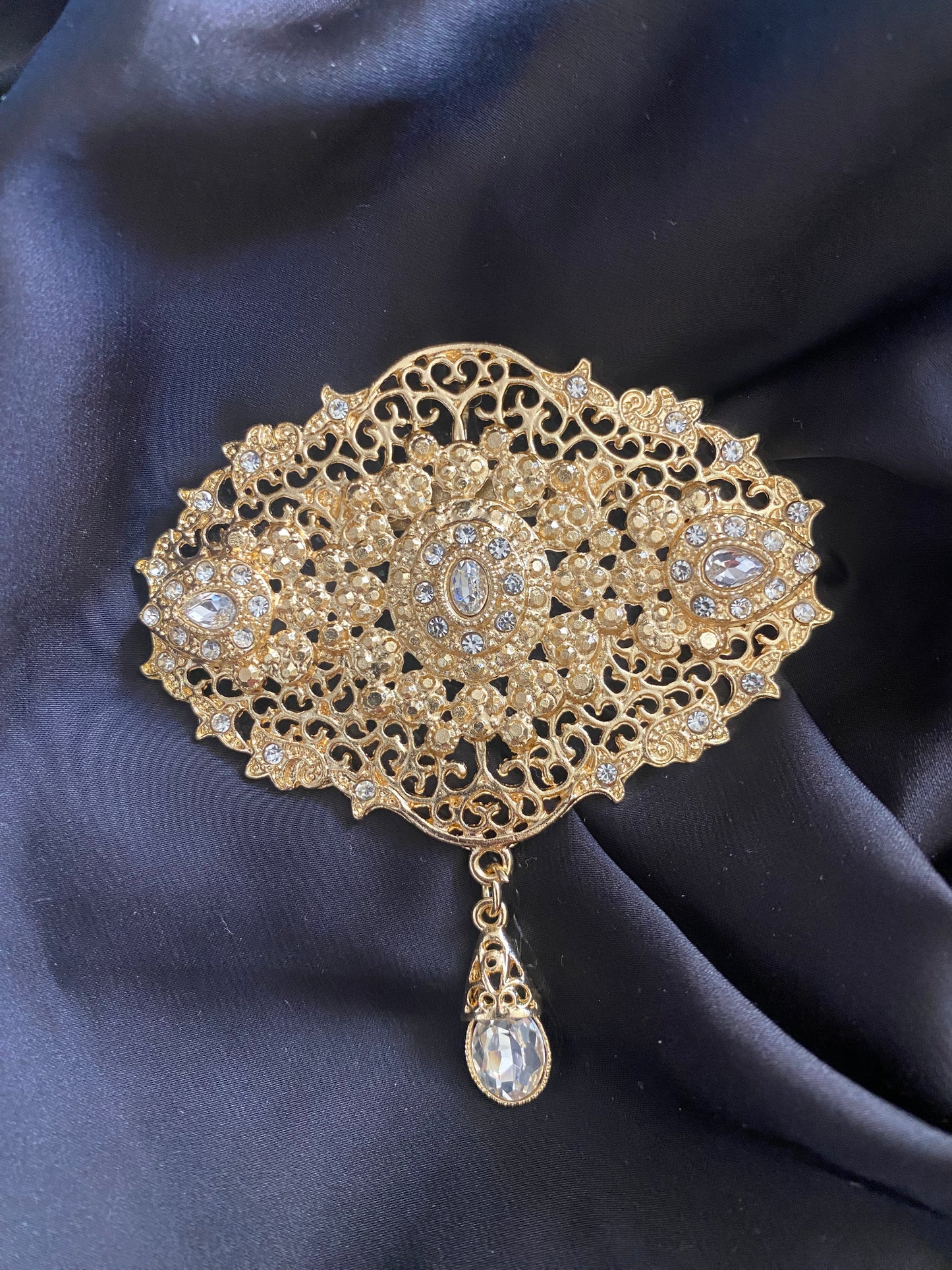 A brooch of your choice